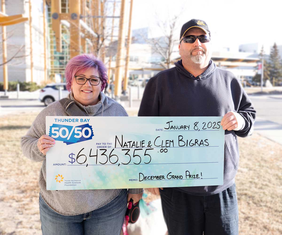 Natalie and Clem Bigras of Hanmer, Ontario with their record-breaking Thunder Bay 50/50 cheque &mdash; $6,436,355, December 2024